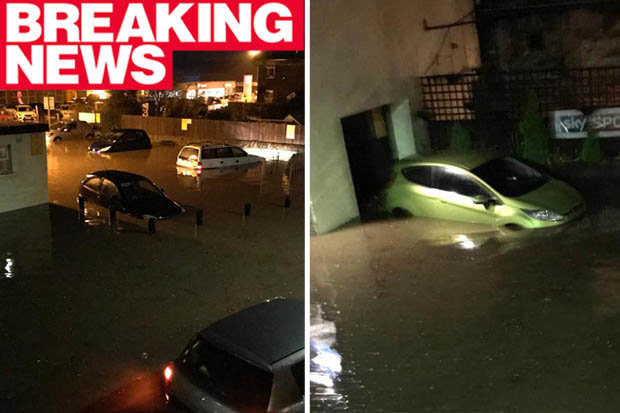 torrential rainfall floods UK