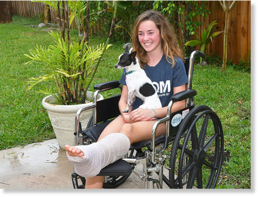 Click to enlarge Kaia Anderson, 14, of Floridana Beach (south of Melbourne Beach) was bitten by a shark this past Saturday while surfing. While being interviewed, their dog Spot wanted to be in the photo.