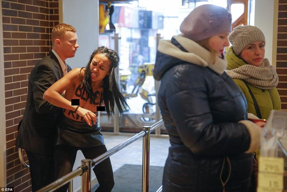 Click to enlarge Femen Ukraine protester
