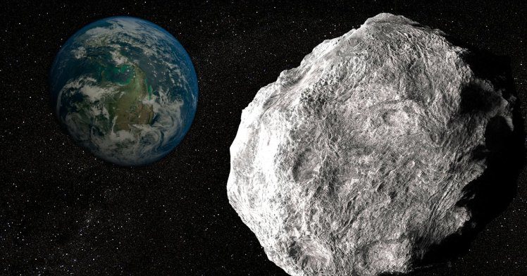 An artist’s impression of a massive space rock zooming near Earth (Picture: Science Photo Library/Getty)