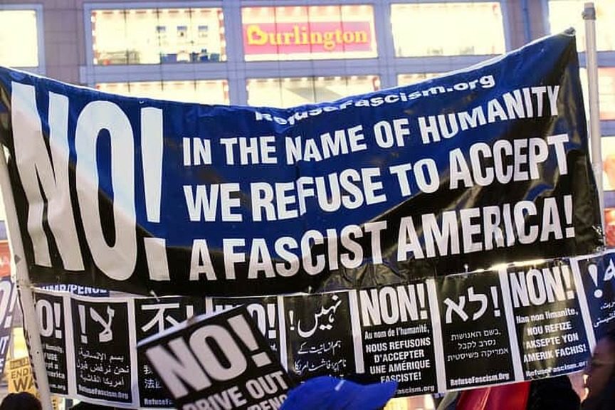 no corporate fascism protest
