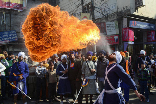 Click to enlarge Sikh Nihang (warrior) performs a fire breathing Energy-based alien life