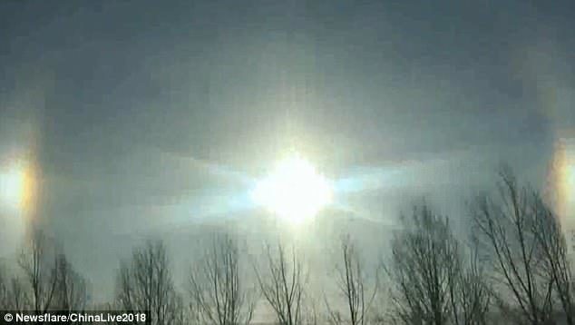 Click to enlarge Sun dogs over northern China