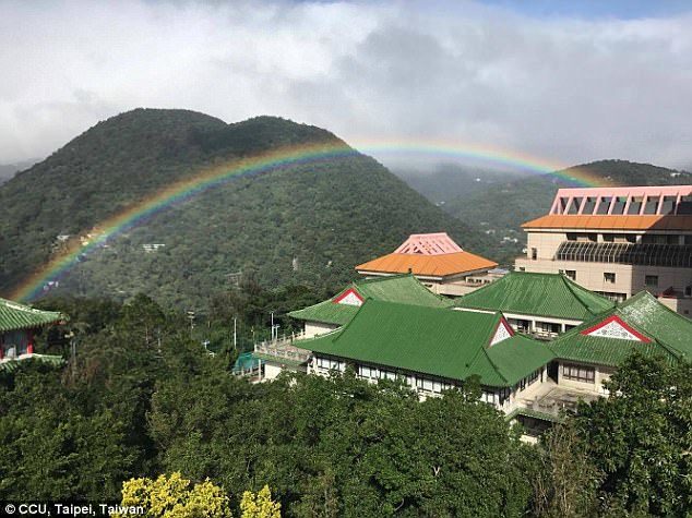 The arc of the rainbow spread across the university campus from 7am to 4pm