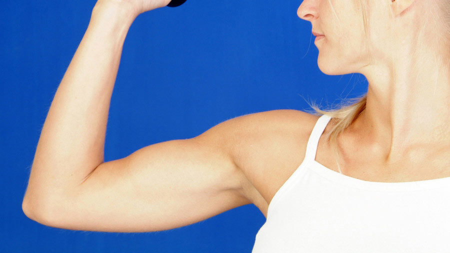 woman flexing muscle