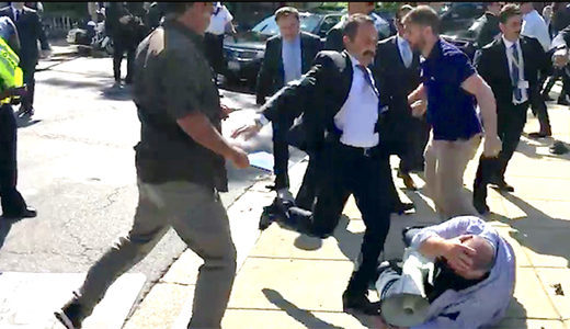 Click to enlarge Turk guards beat civilian