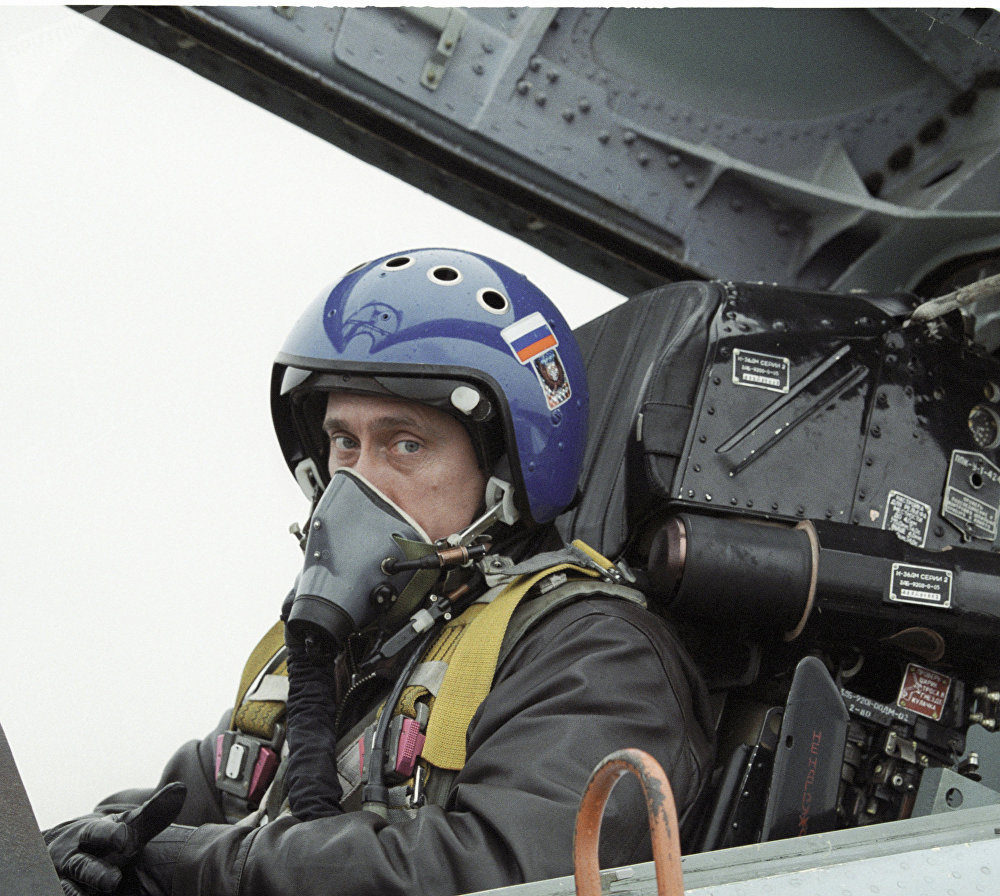 Click to enlarge Vladimir Putin in the cockpit of the Su-27 fighter