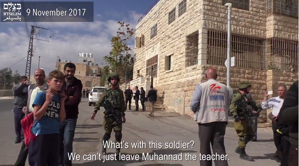 Israel military harass Palestinian