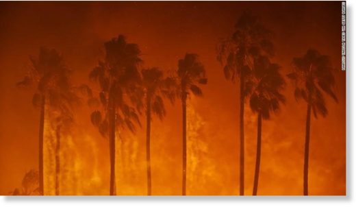 Thousands flee as winds whip California fires