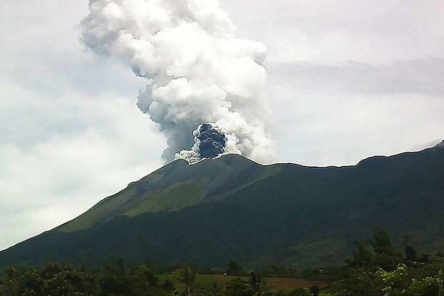 Click to enlarge A photo taken on Saturday, June 18, 2016 and released by the Philippines Institute of Volcanology and Seismology (Phivolcs) shows Kanlaon volcano spewing ash into the air