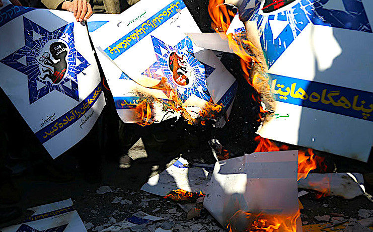 Israeli posters burn