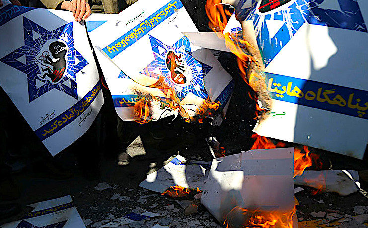 Click to enlarge Israeli posters burn