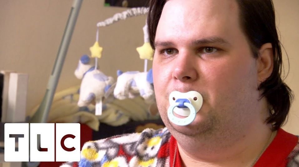 man with pacifier