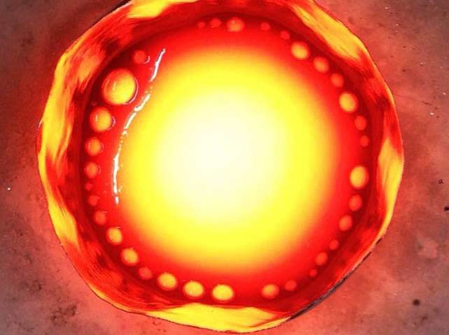 Click to enlarge Bubbly magma in laboratory