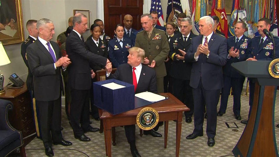 Click to enlarge Trump signs $700 billion military budget bill