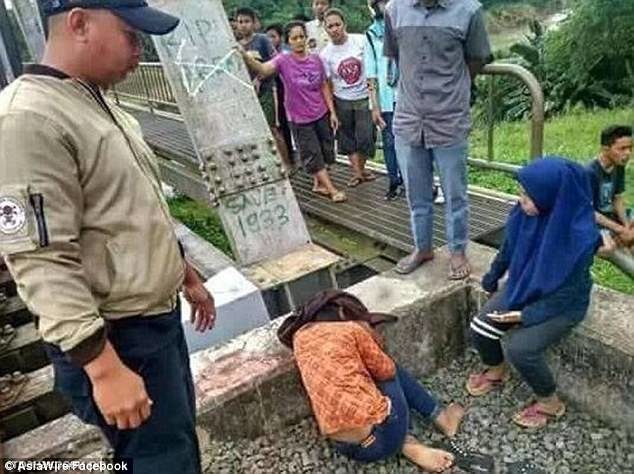 Injury: Ms Hayati was thrown to the ground by the train and her skull was cracked open