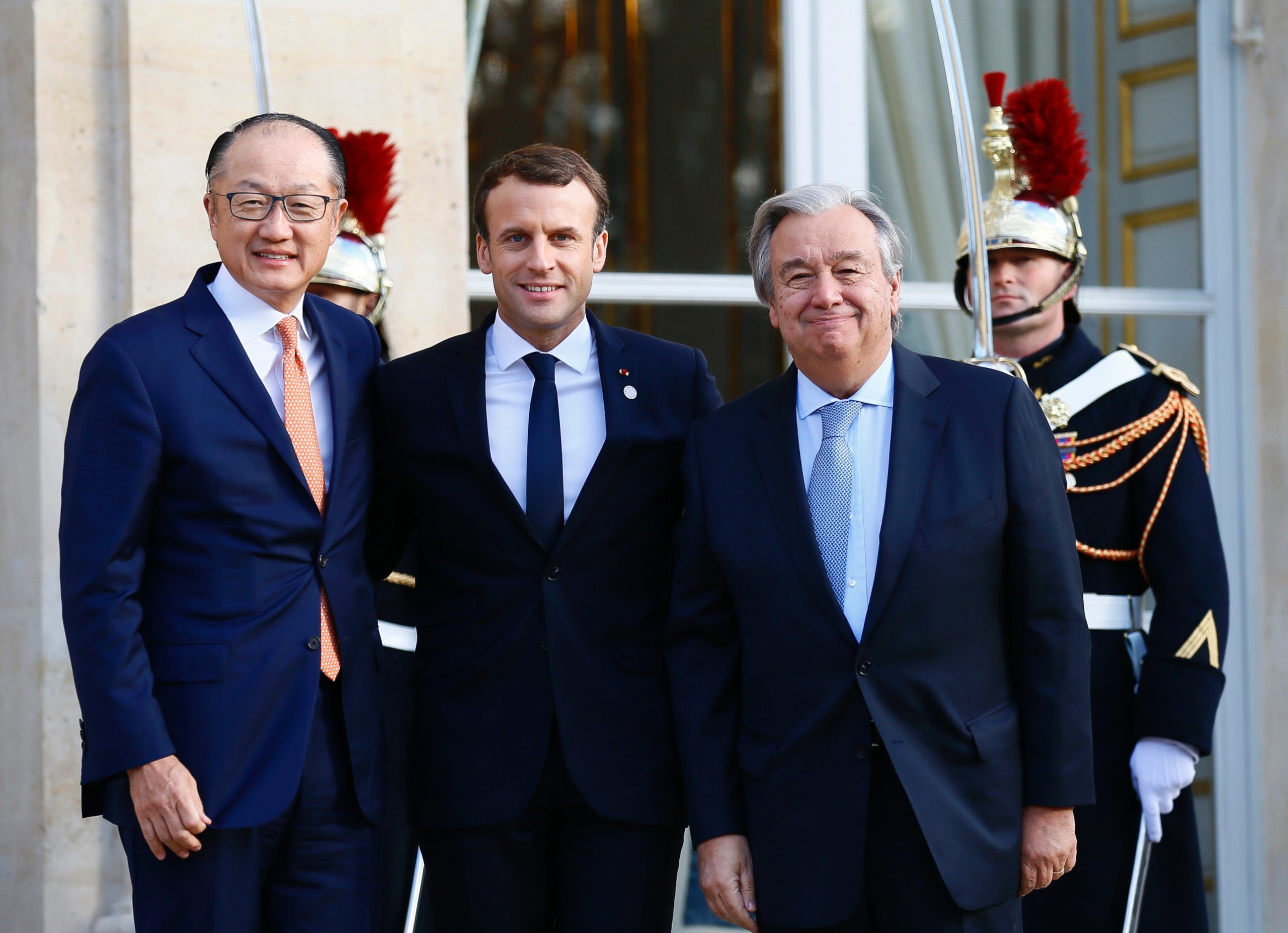 French President Emmanuel Macron attends a meeting with World Bank President Jim Yong Kim and United Nations (UN) Secretary General Antonio Guterres at the Elysee Palace as part of the One Planet Summit in Paris, France, December 12, 2017.