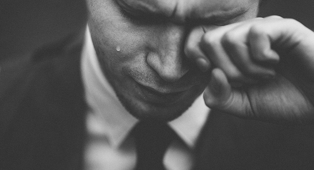 Click to enlarge man crying