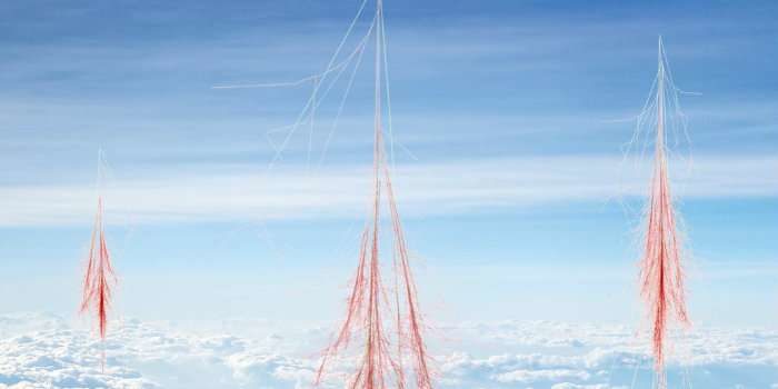 Click to enlarge Cosmic rays interacting with the Earth's atmosphere