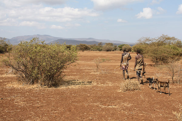 Two Hadzabe men in Tanzania returning from a hunt.