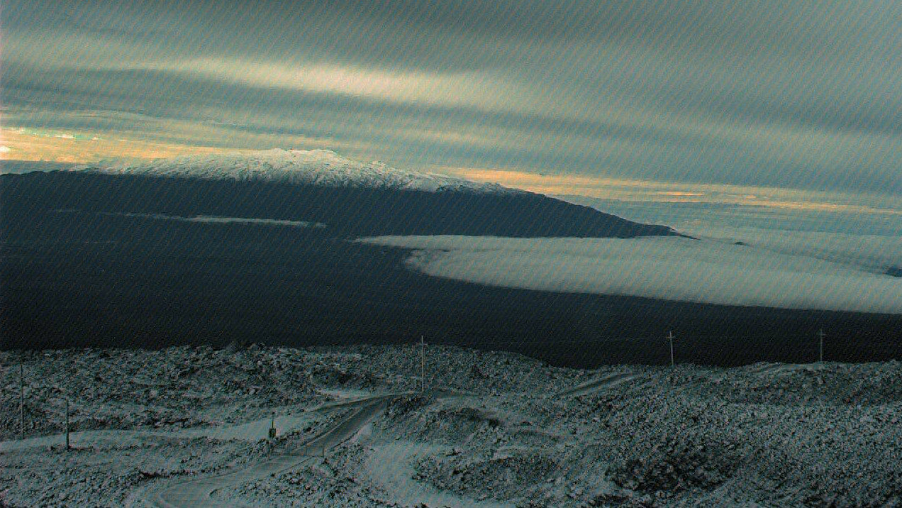 Click to enlarge Mauna Kea, as seen from snow covered Mauna Loa