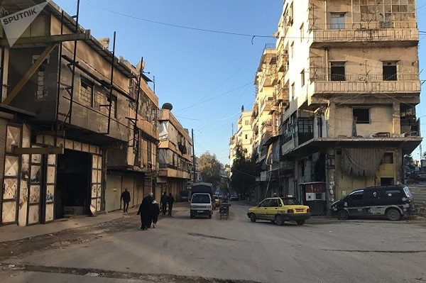 Residents in al-Midan neighborhood in Syria's Aleppo