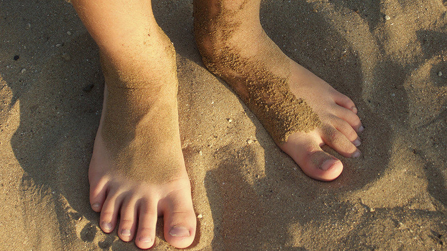 feet in sand
