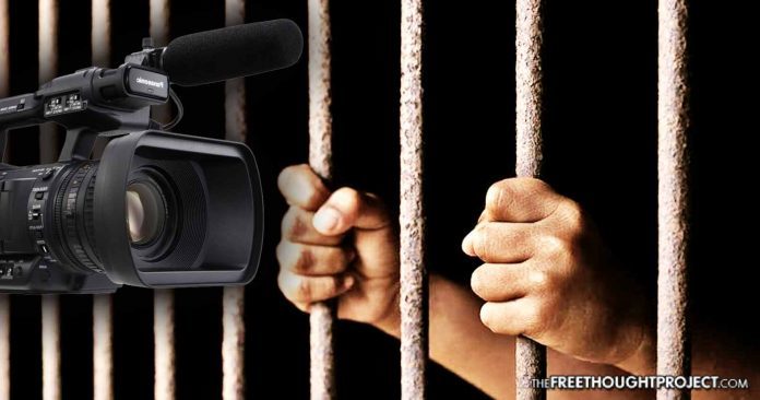 hands behind bars