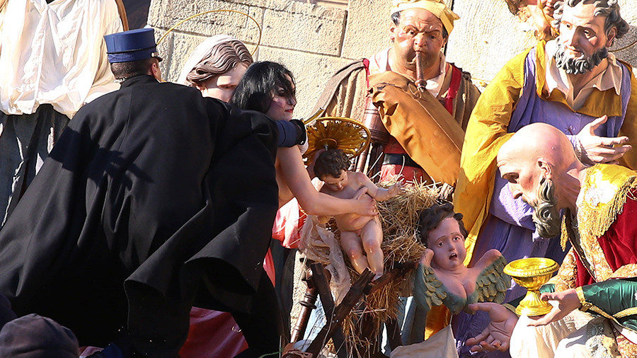 Click to enlarge FEMEN activist