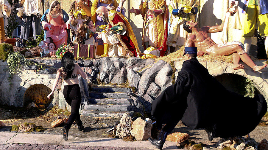 Click to enlarge FEMEN activist