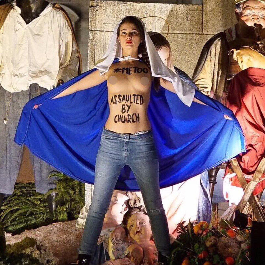 Click to enlarge FEMEN activist