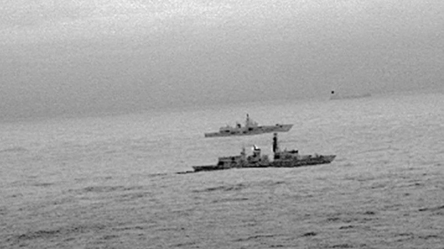 Click to enlarge Royal Navy frigate HMS St Albans escorting Russian warship Admiral Gorshkov
