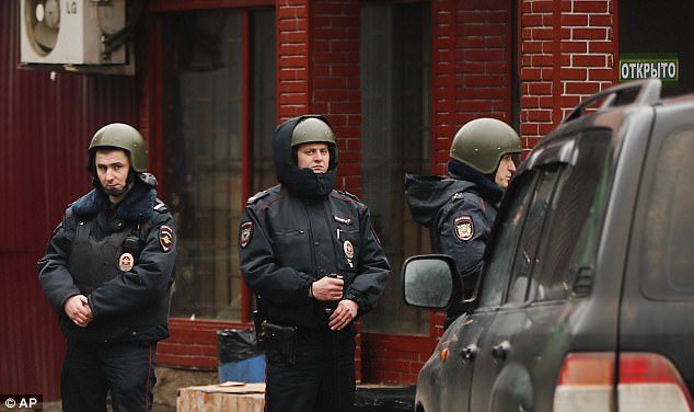 Click to enlarge Special forces troops were preparing to storm the Menshevik sweet plant amid reports that the plant's owner was holed up inside with weapons