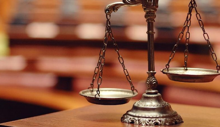 Click to enlarge The scales of justice