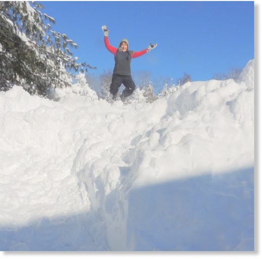 Click to enlarge Caroyln Yerdon, the NWS observer in Redfield, climbed atop a 15-foot pile of snow on Wednesday to celebrate Redfield's (unofficial) record for the most snow to fall in Oswego County in 48 hours.