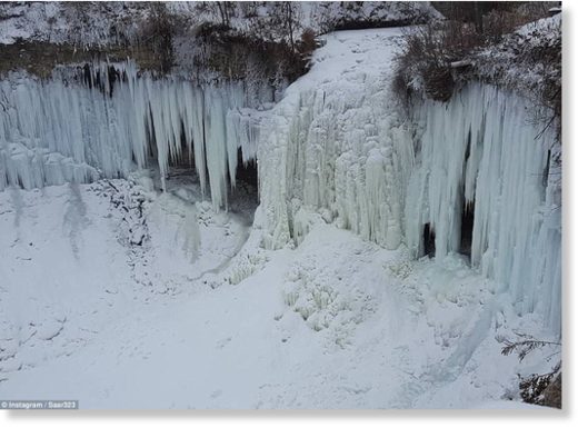 Click to enlarge The popular attraction has completely frozen over due to the super cold single-digit temperatures that have gripped the state over the past few days