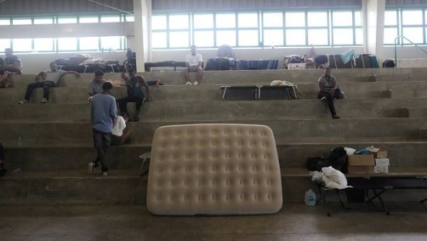 People who lost their homes during Hurricane Maria in September rest at a gymnasium of a school turned shelter in Canovanas.
