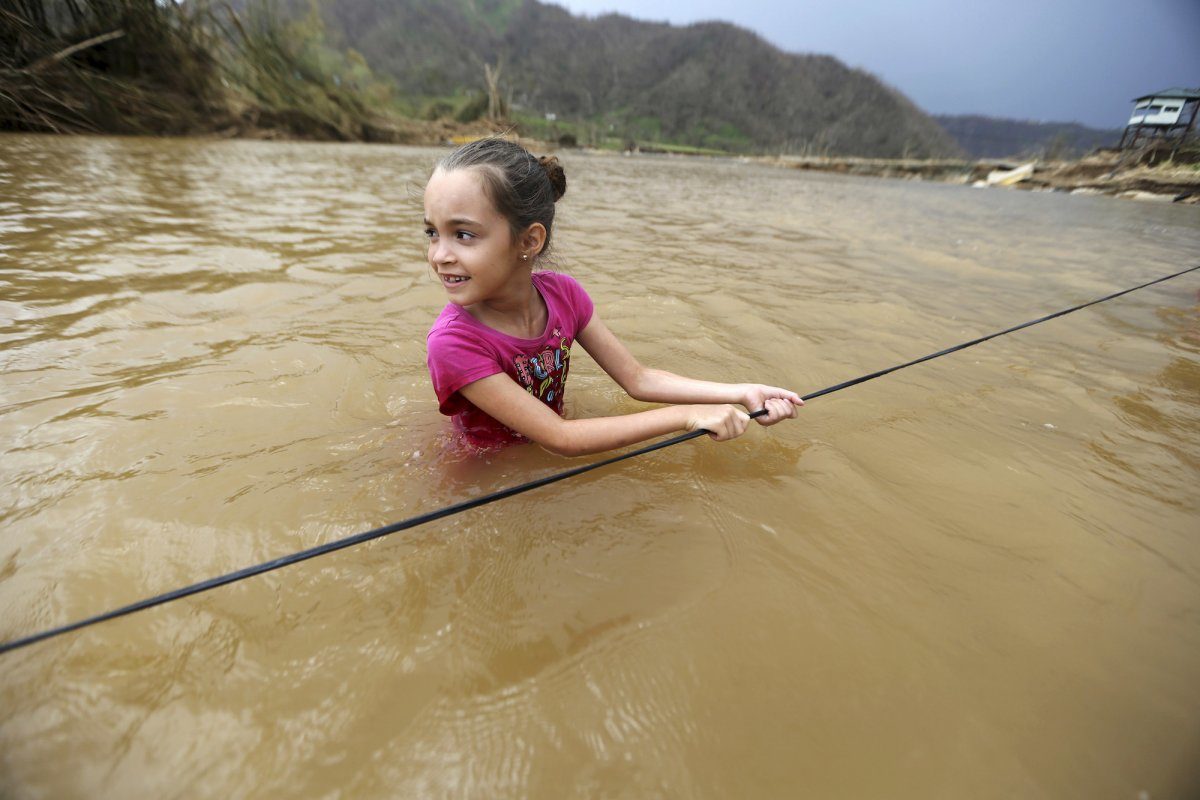 Click to enlarge Hurricane Maria swept away bridge