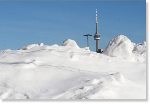 Click to enlarge Snow piles up in parking lots at the Canadian National Exhibition as Toronto tries to stay warm in the extreme cold.
