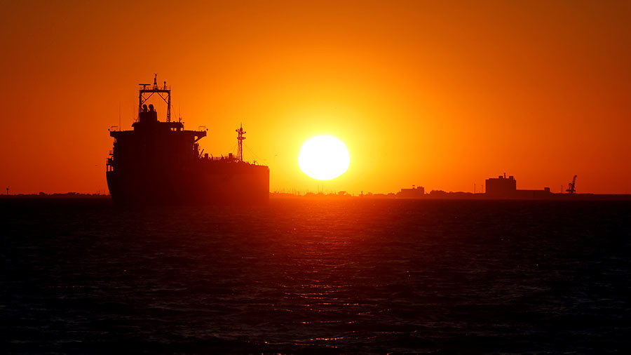oil tanker at sunset