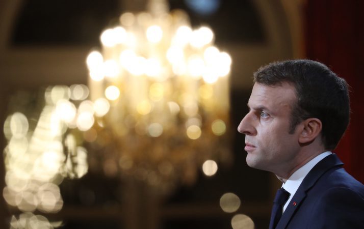 French President Emmanuel Macron speaks to the press at the Elysee Palace in Paris, on January 3, 2018