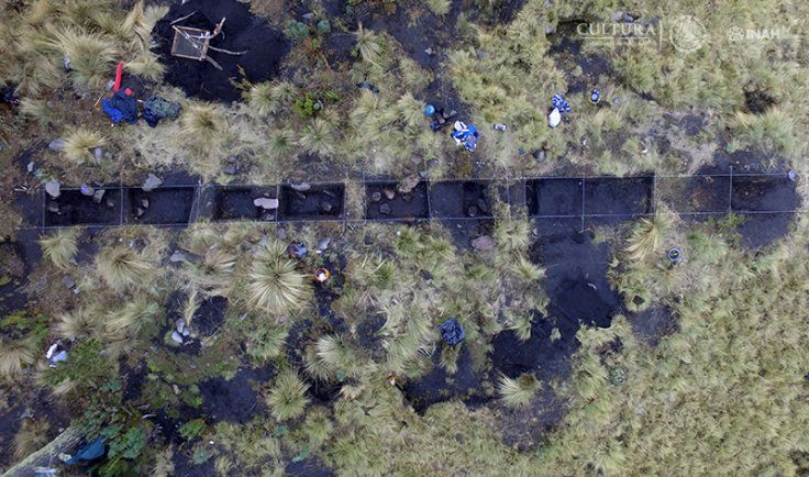Researchers excavate remains of artifacts associated with the Aztec rain god Tlaloc