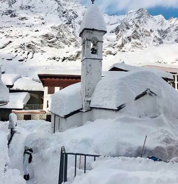 A church covered in snow in Cervinia.