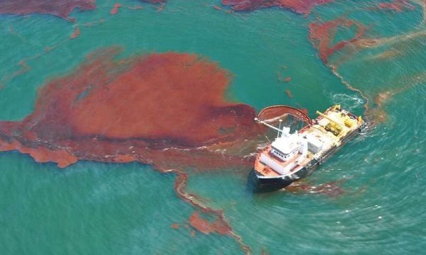Click to enlarge Skimming oil in the Gulf of Mexico