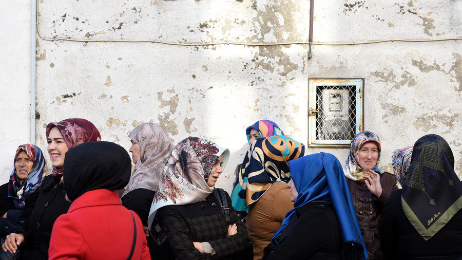 Click to enlarge ‘Historic step’: Greece curbs powers of Islamic Sharia courts Women of Muslim community wait for the arrival of Turkish President Tayyip Erdogan, near a mosque in the city of Komotini, Greece