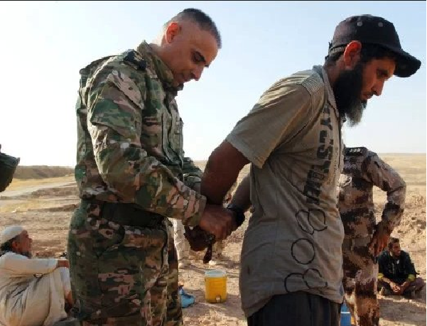 Click to enlarge ISIS arrest