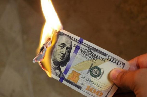 burning american dollar money