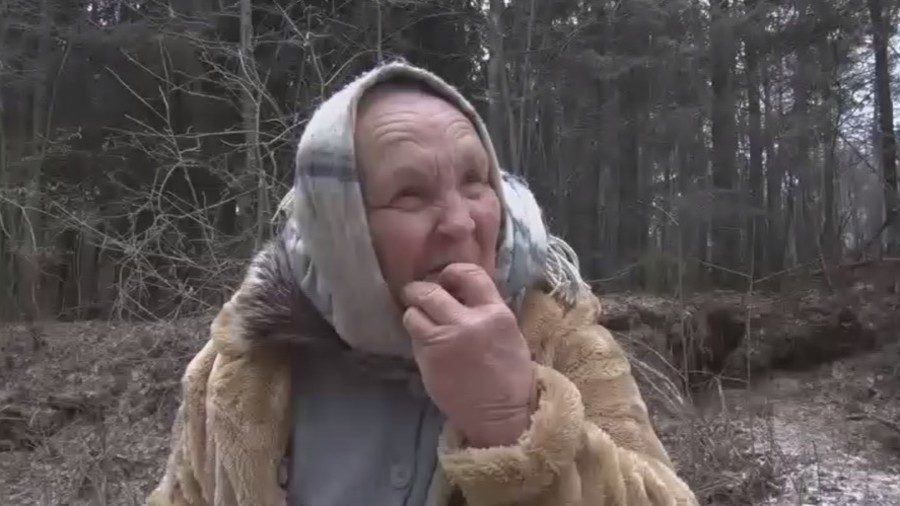 Click to enlarge Woman eating sand