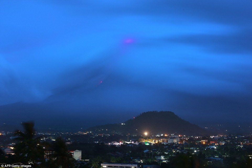 Click to enlarge The crater began glowing on Sunday evening, in what is believed to be a sign of the growth of a new lava dome