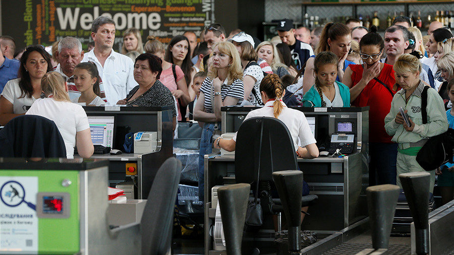 Click to enlarge FILE PHOTO Passengers wait to have their luggage checked at the capital's main airport, Boryspil, outside Kiev, Ukraine Valentyn Ogirenko / Reuters